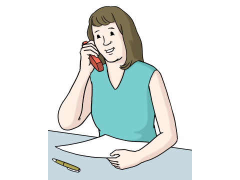 Eine Frau am Telefon nimmt ein Gespräch entgegen