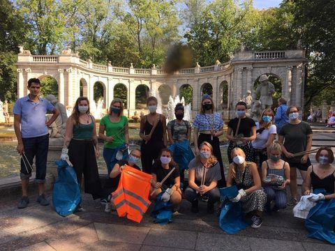Volunteers gather to help on a clean-up day in Friedrichshain park.