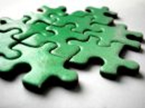 Steine eines grünen Puzzlespiels