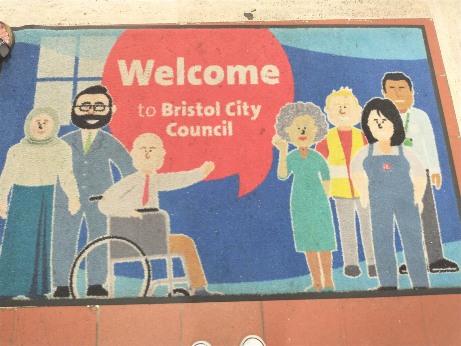 Eine Fußmatte zeigt den Text "Welcome to Bristol City Council"
