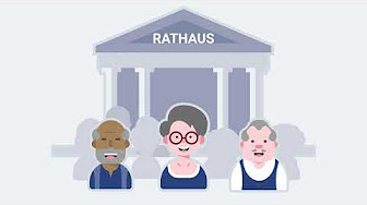 Bild von drei älteren Menschen vor einem Rathaus