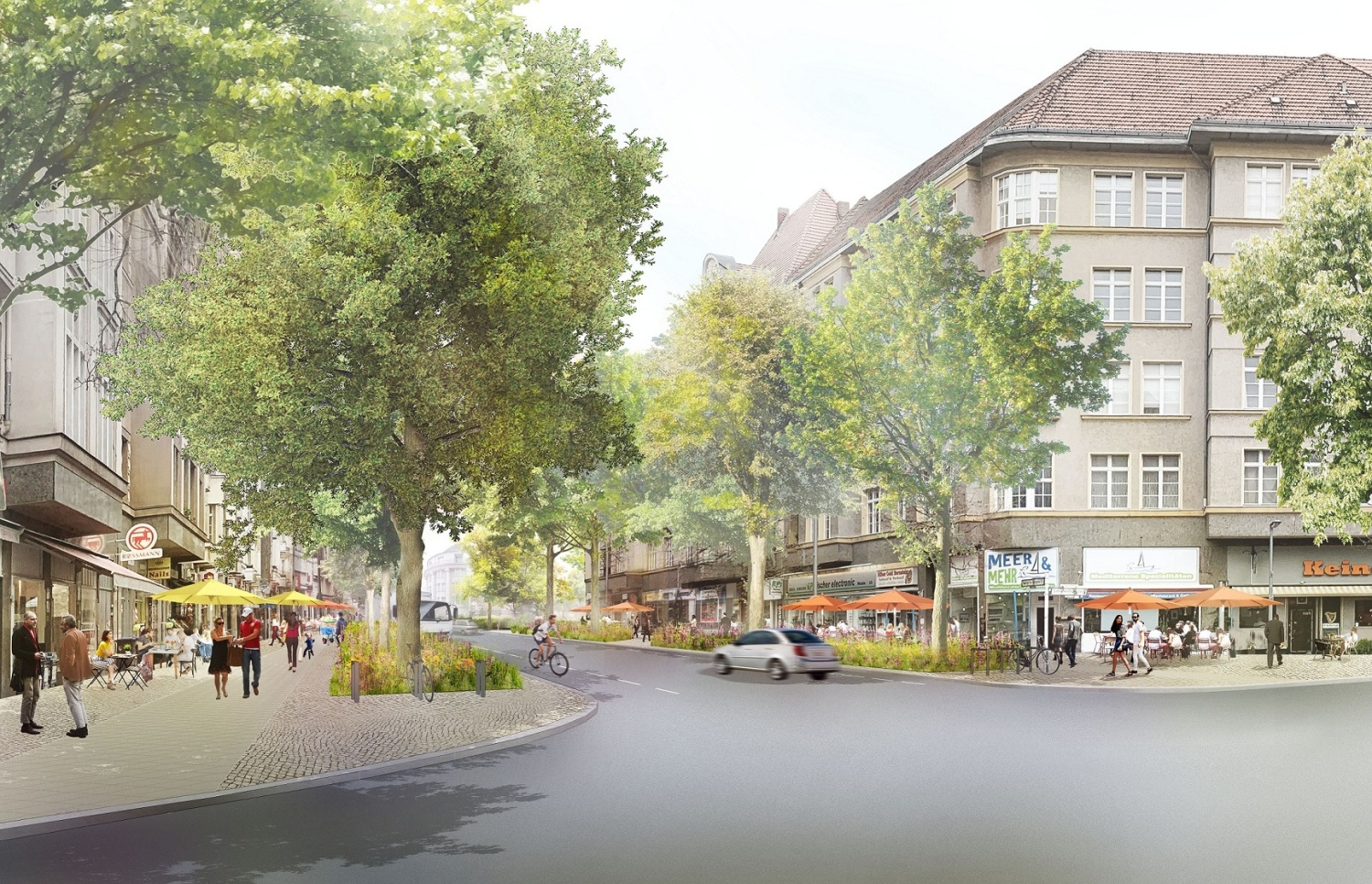 Ein Auto und ein Fahrrad fahren an einer Kreuzung.