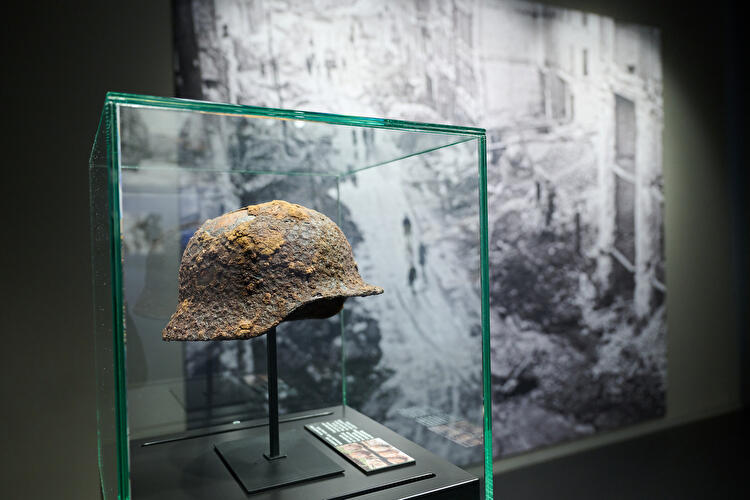 Steel helmet in the exhibition at the German Resistance Memorial Center
