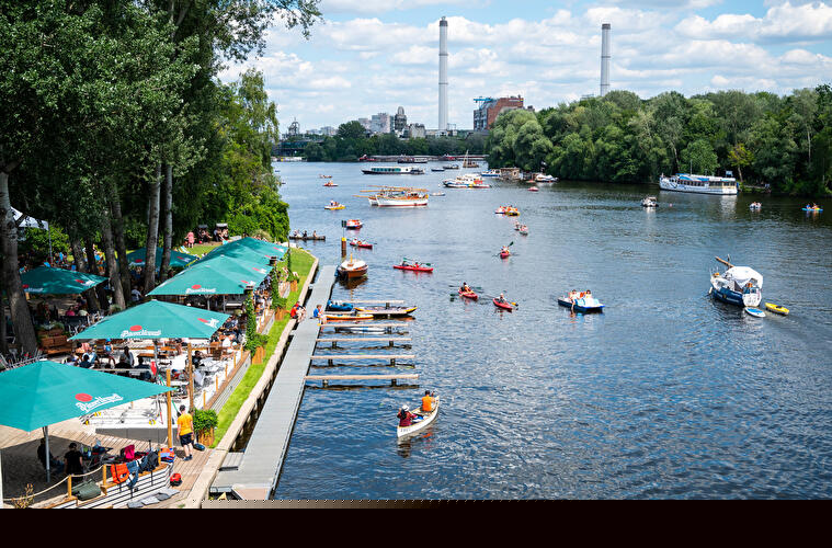 Kayaks and pedal boats are out on the Spree