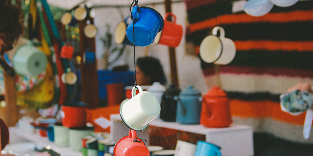 Market stall with enamel tableware