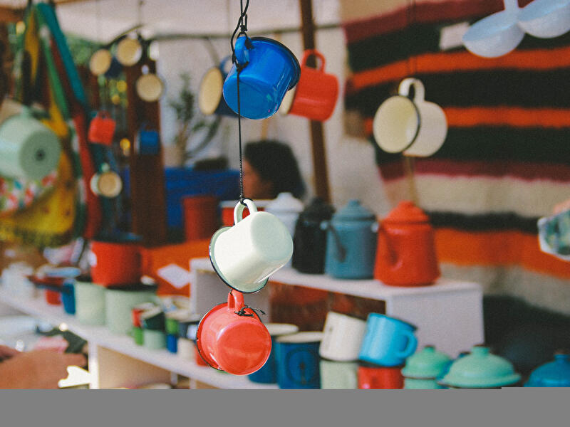 Market stall with enamel tableware