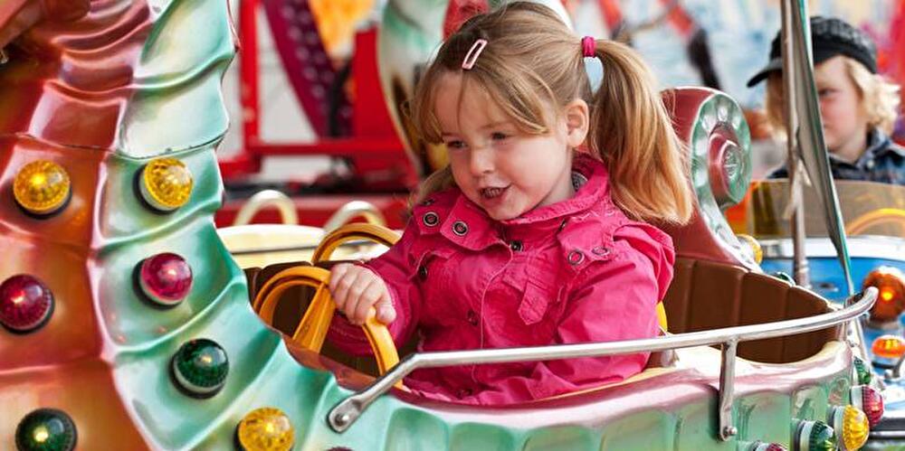 Kind im Karussell
