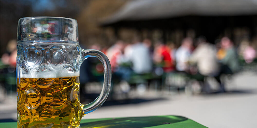 A beer mug filled with beer