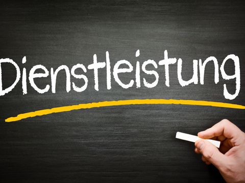 Tafel mit dem Schriftzug Dienstleistung