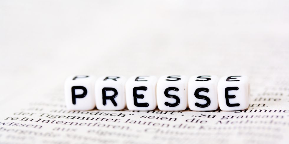Würfel mit Aufschrift Presse