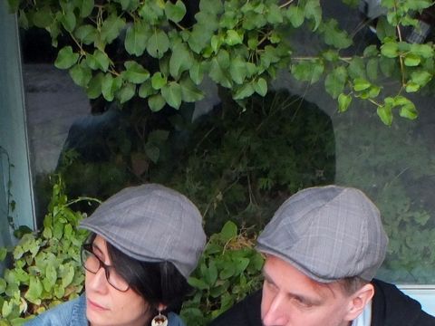 baby behind the curtain