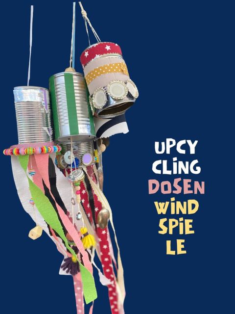 Bunt beklebte Konservendosen als Windspiel