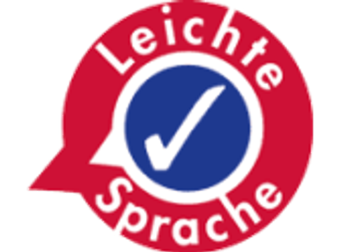 Schriftzug Leichte Sprache im blauen Kreis mit einem Häkchen
