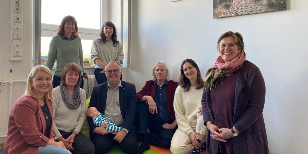 Team der Schreibabysprechstunde sitzt zusammen