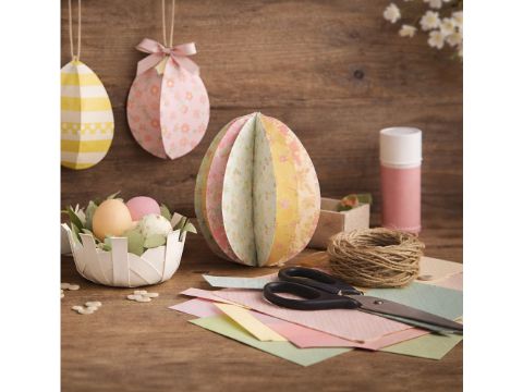 verschiedene gebastelte Ostereier aus Papier und Bastelmaterialien