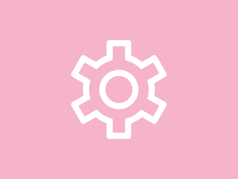 Zahnrad auf rosa Hintergrund