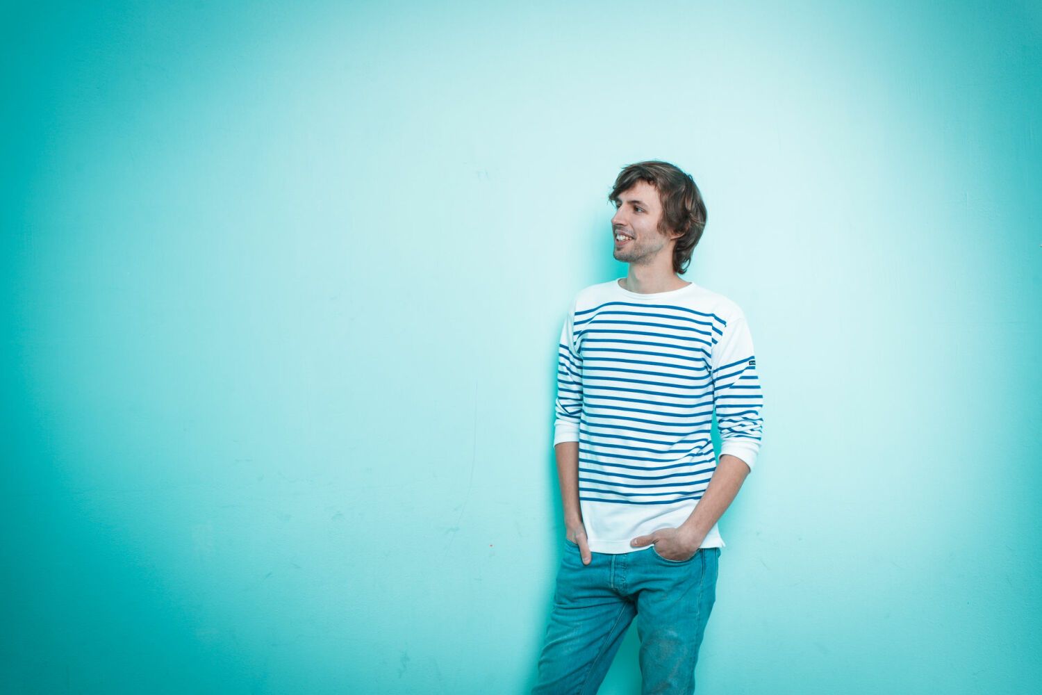 Profil von Dr. Sven Köppel vor blauem Hintergrund