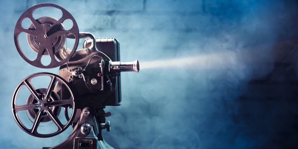 old film projector with dramatic lighting