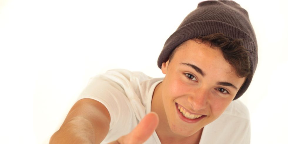 Teenager Daumen hoch