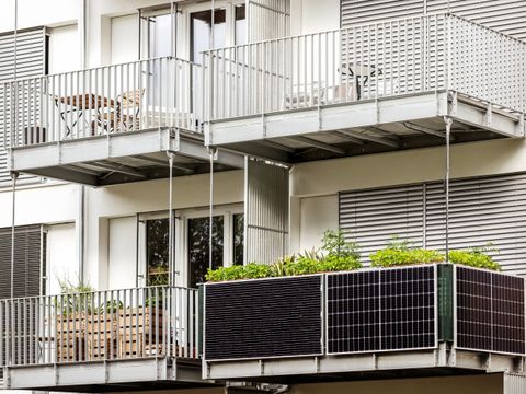 Solar panels on Balcony of Building. Modern Balcony Apartment with Solar panel.