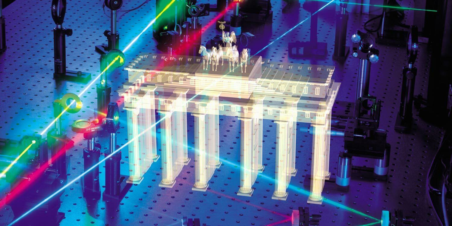 A hologram of the Brandenburg Gate with laser beams