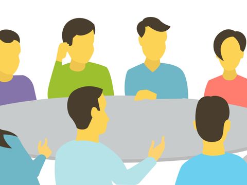 Gezeichnete Menschen an einem Runden Tisch