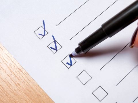 To do checklist on a light floor.