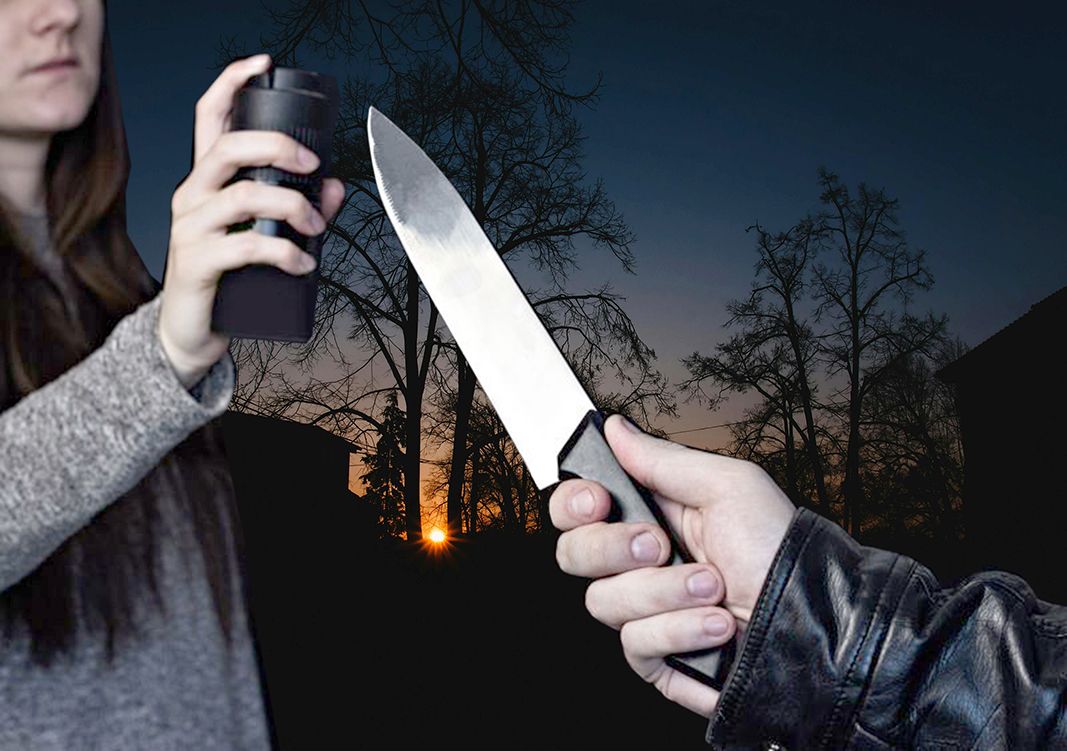 Hand mit Messer und ein Reizgassprühgerät, welches von einer Frau genutzt wird