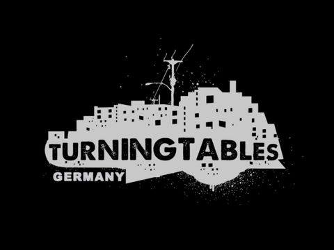 Logo mit Häuseransicht und Schriftzug Turning Tables Germany