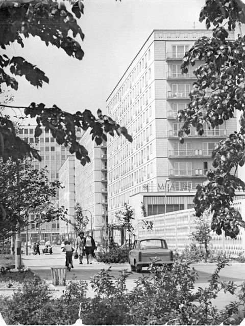 Prefabricated panel buildings at the western end of Karl-Marx-Allee, Haus des Lehrers (House of the Teacher) in the background at the left