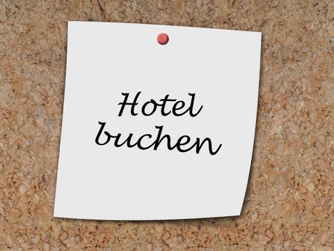 Hotel Buchen auf ein Memo geschrieben