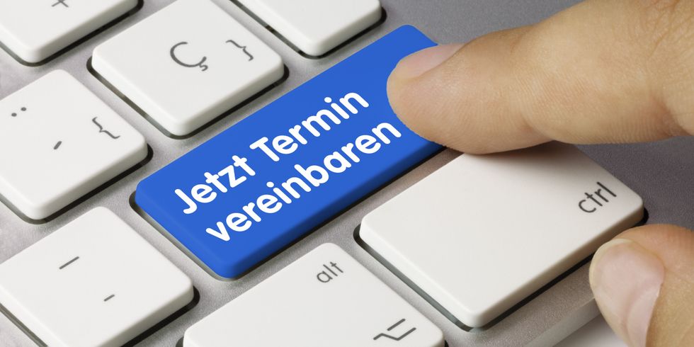 Computertaste mit dem Text "Termin vereinbaren"