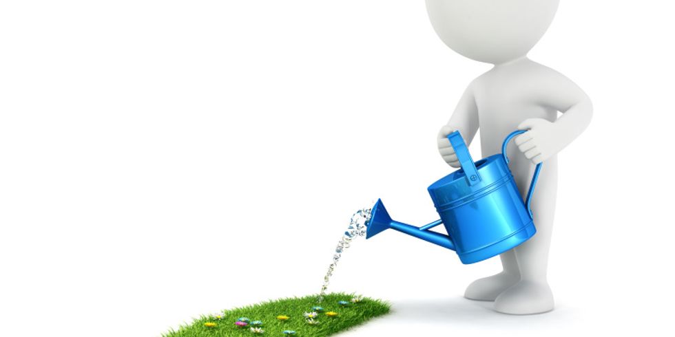 3D Figur gießt einen Pfad mit Rasen und Blumen