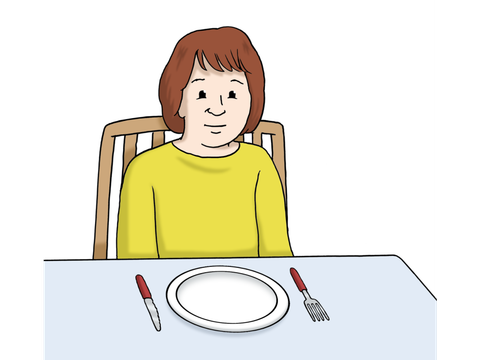 Kind vor leerem Teller