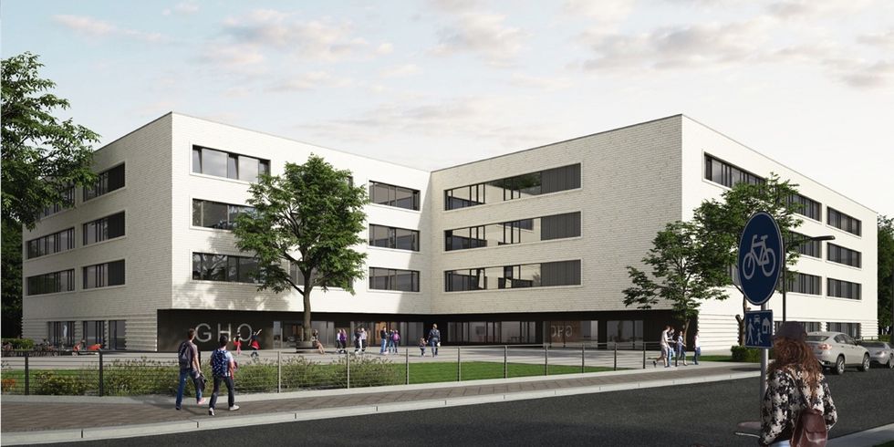 Ein weißes modernes Gebäude mit langen Fensterreihen ist umgeben von kleinen Grünflächen und Bäumen.