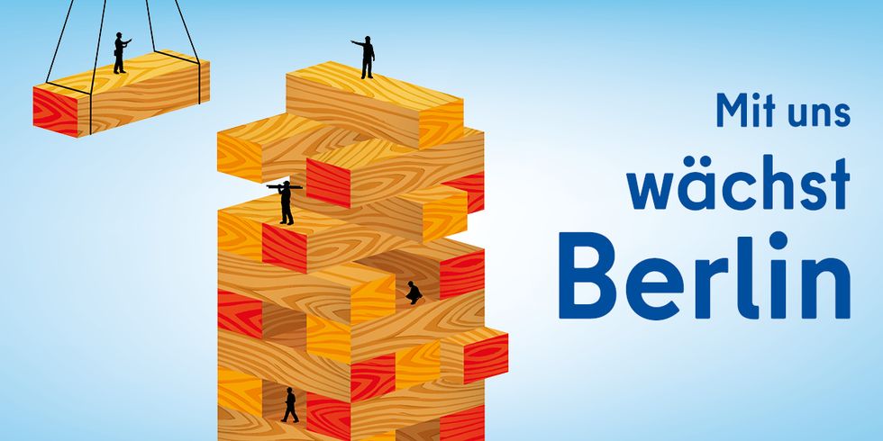 gestapelte Holzmodule zu einem Turm. "Mit uns wächst Berlin"