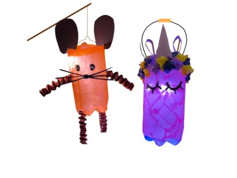 zwei selbstgebastelte Laternen in Form einer Maus und eines Gesichtes