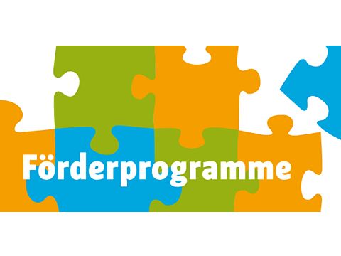 Bunte Puzzleteile mit der Aufschrift Förderprogramme