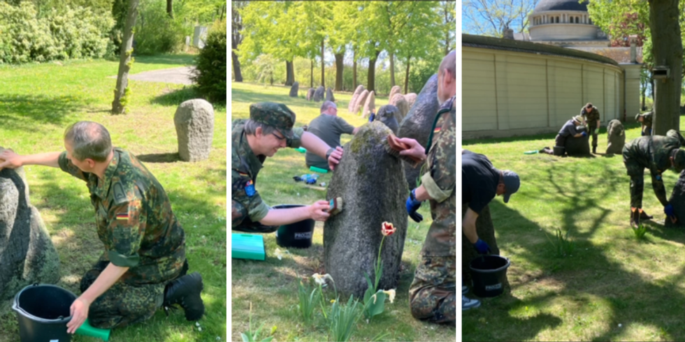 Reinigung der Kriegsgräber auf dem Friedhof Altglienicke