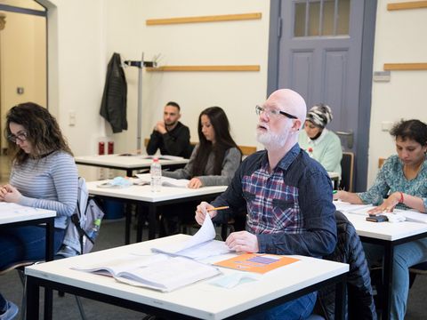 Lerngruppe im Kursraum