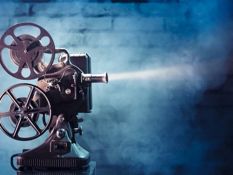 old film projector with dramatic lighting