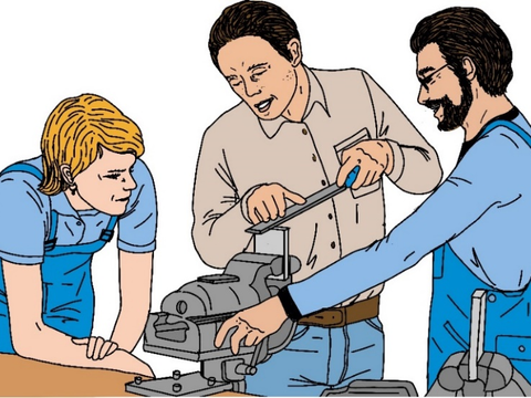 drei Handwerker an der Werkbank