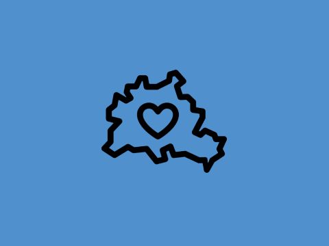 Umriss der Stadt Berlin auf der Landkarte mit Herzsymbol in der Mitte vor blauem Hintergrund
