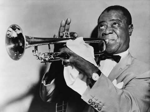Louis Armstrong mit seiner Trompete