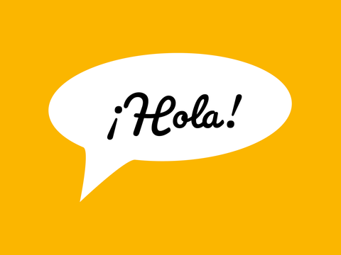 Postkarte auf der in einer Sprechblase Hallo in spanischer Sprache steht.