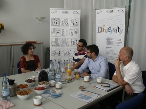 Besprechung beim Projekt Carriera