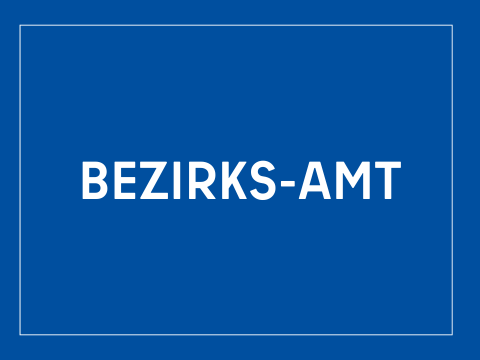 Kachel mit der Aufschrift Bezirks-Amt
