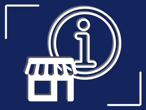Gewerbegebäude vor einem Informations-Icon