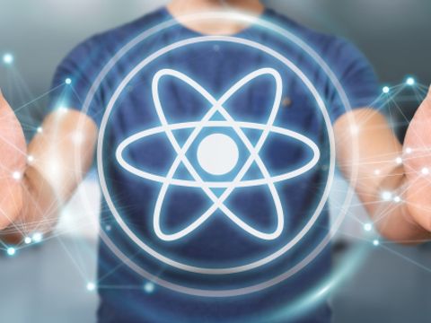 stilisiertes Teilchenmodell symbolisiert Physik