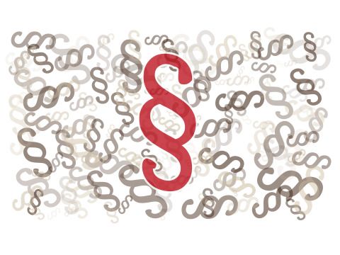 Verschiedene Zeichen für Paragraphen mit einem großen roten Zeichen für Paragraphen